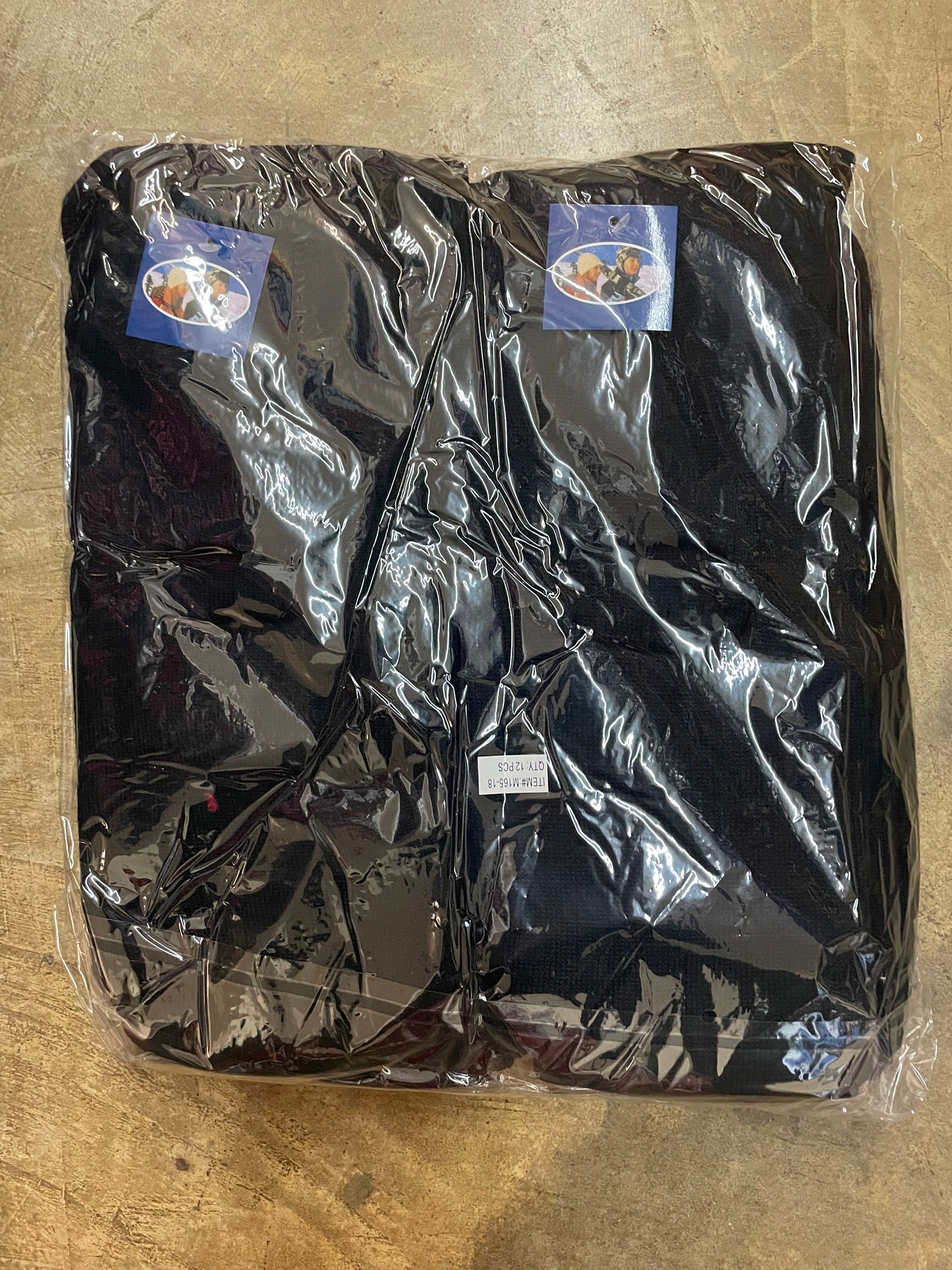 "Gray ski mask with a ribbed knit texture and a moisture-wicking design"