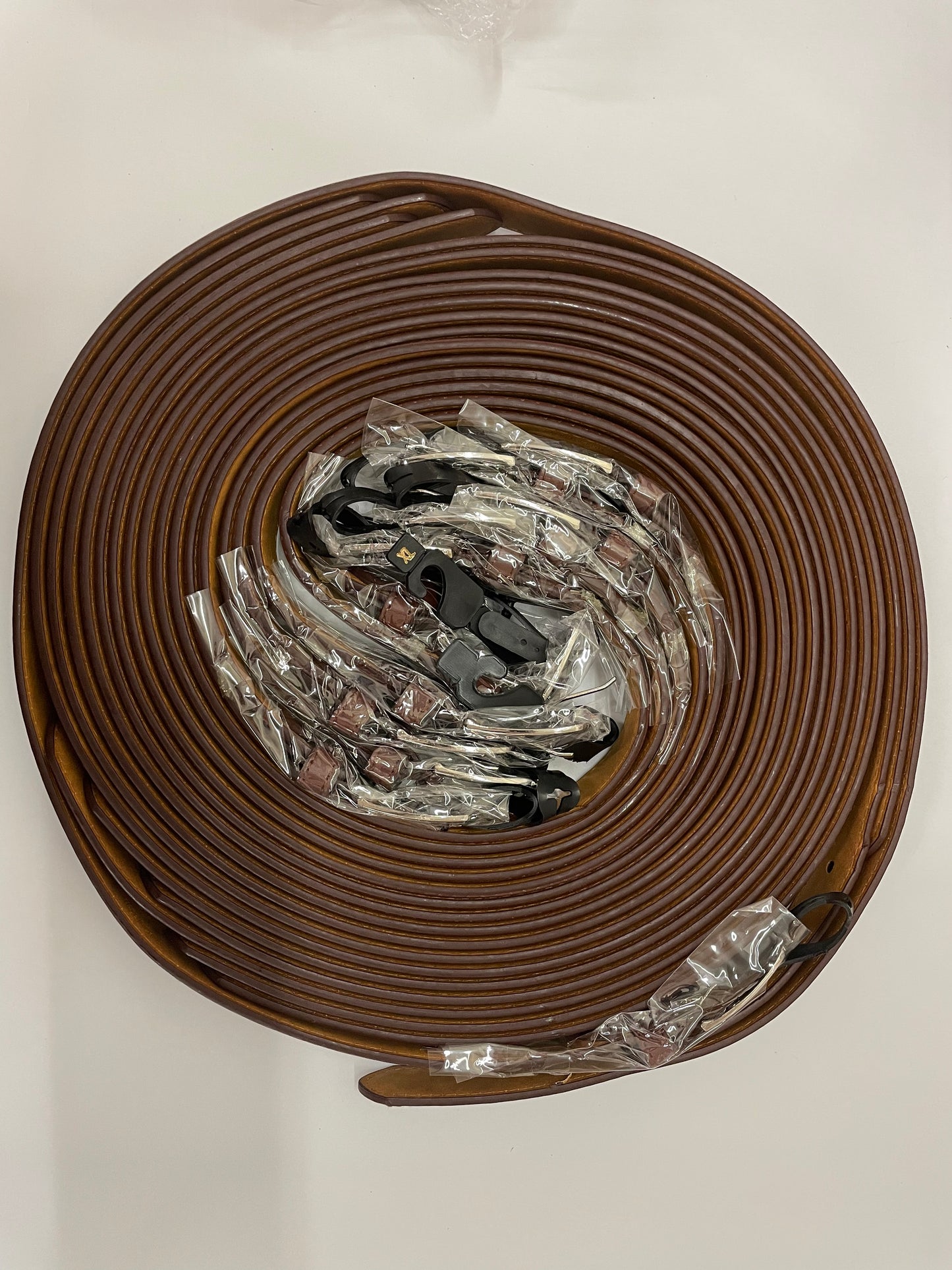 "Brown stretch knit belt with a padded headband and a stretchy fit"