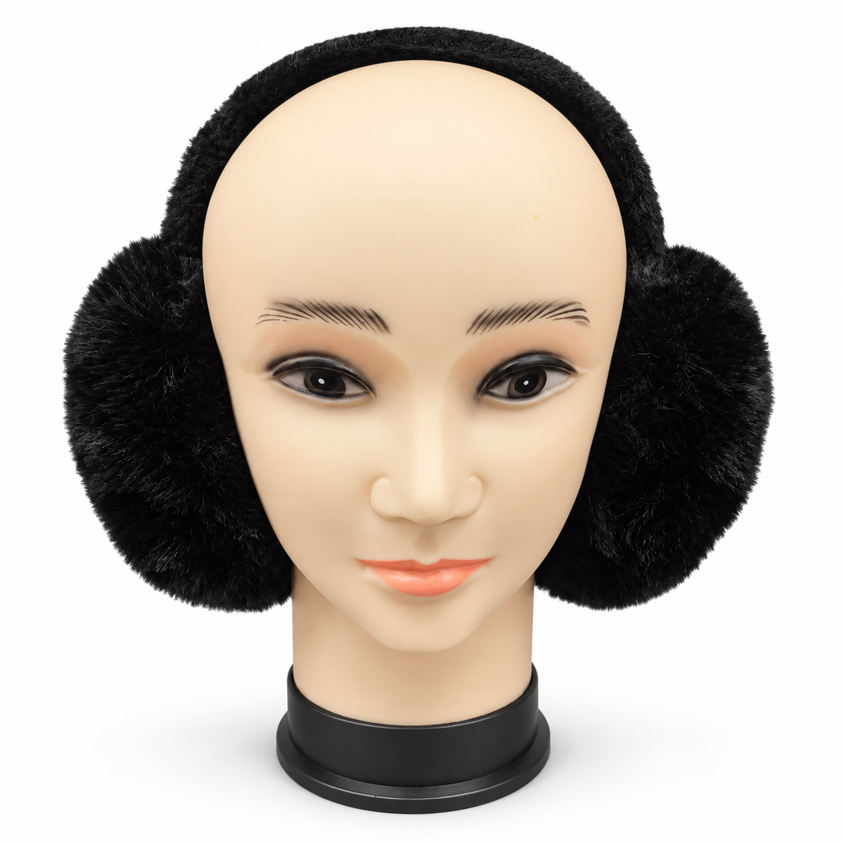 Black plush earmuffs with covered headband displayed on a mannequin head.