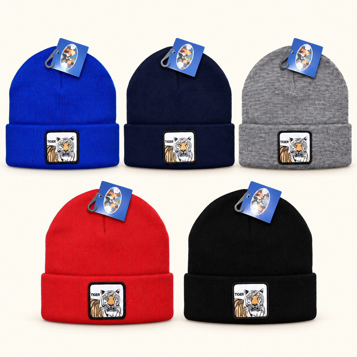 Tiger-patch knit beanies in royal blue, navy, gray, red and black on an off-white background.