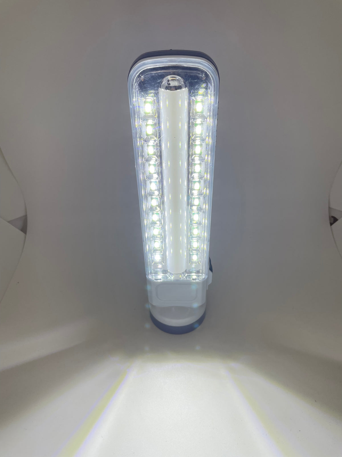 Rechargeable flashlight with illuminated side LEDs
