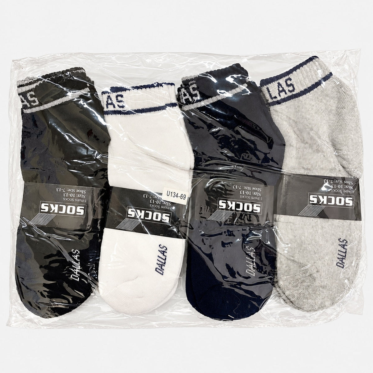 Packaged men’s Dallas ankle socks in dark, white and gray shades