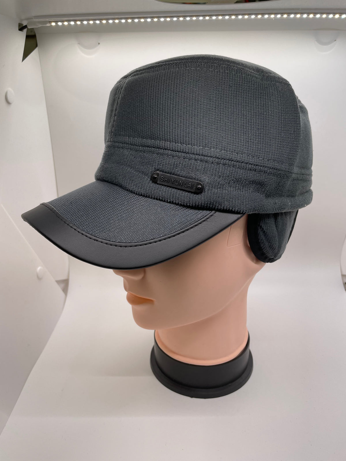 Gray winter cap with ear flaps