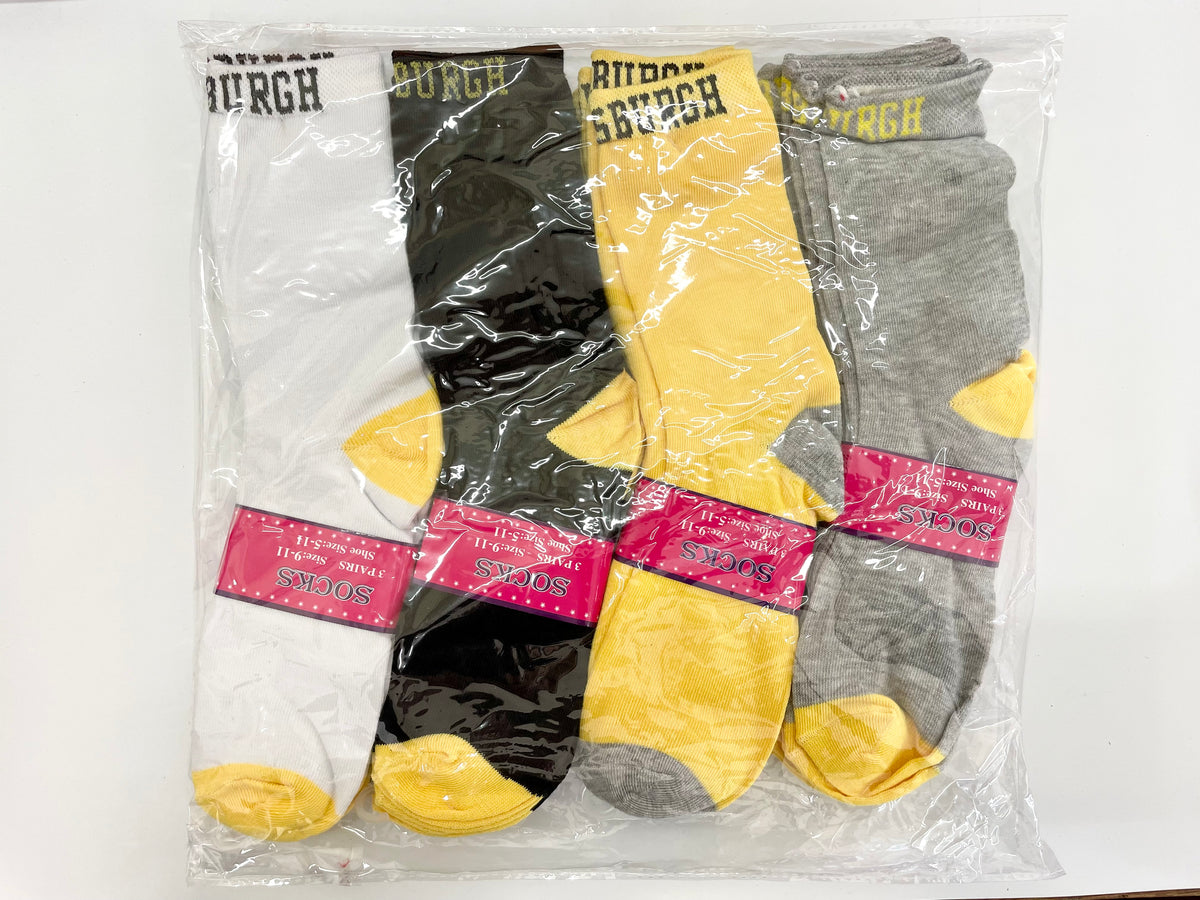 Packaged women’s Pittsburgh crew socks with yellow accents