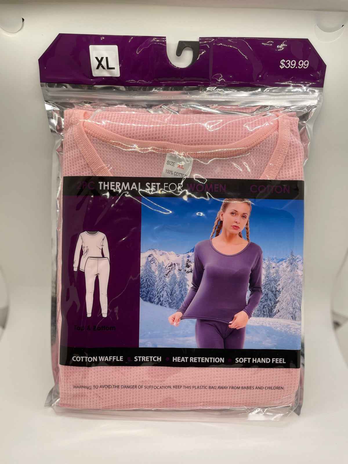 Light pink women's thermal underwear in retail packaging