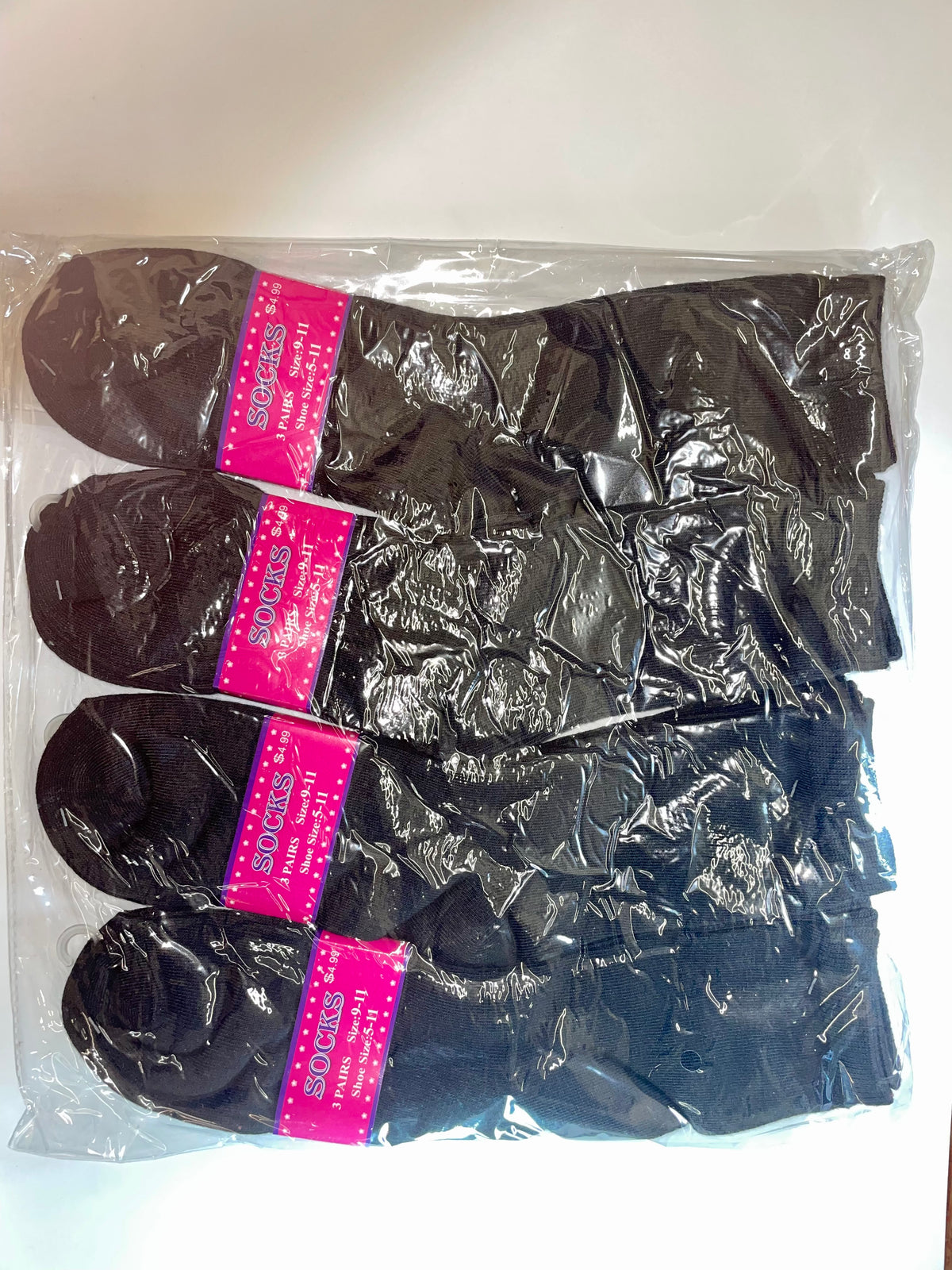 Packaged dark women’s crew socks