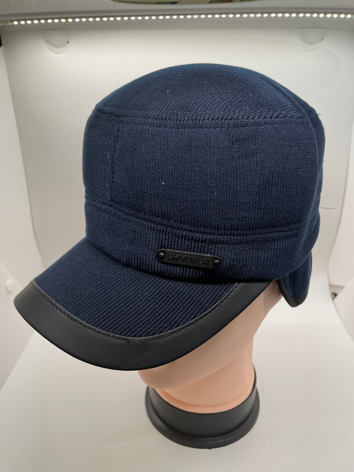 Navy winter cap with ear flaps
