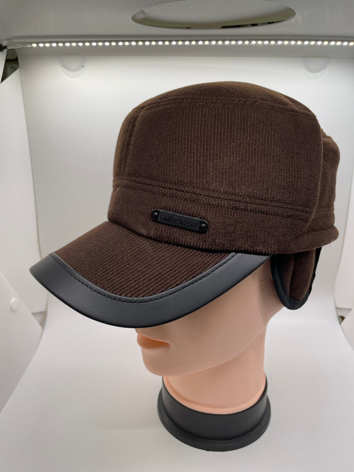 Brown winter cap with ear flaps