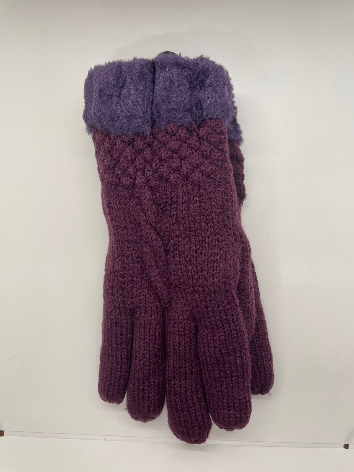 Purple cable-knit winter gloves with fuzzy cuffs