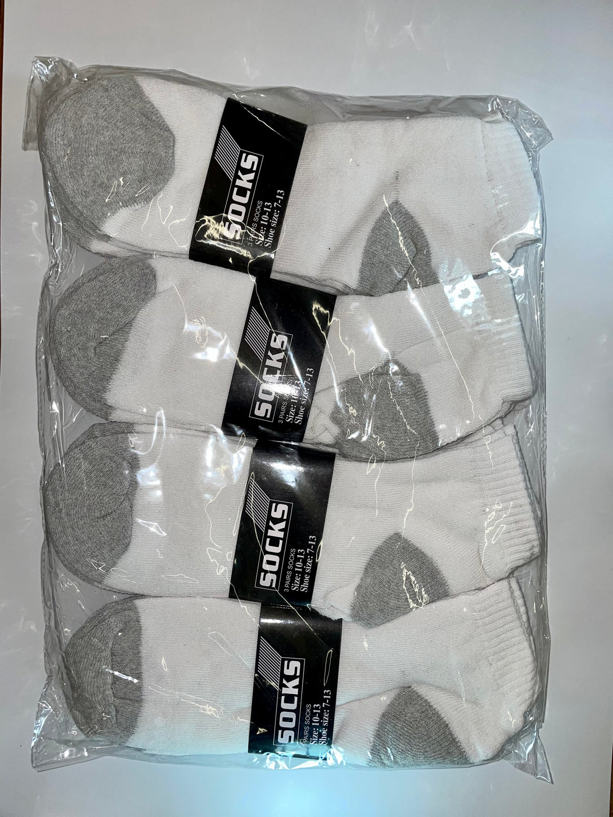White men’s ankle socks with gray heel and toe areas