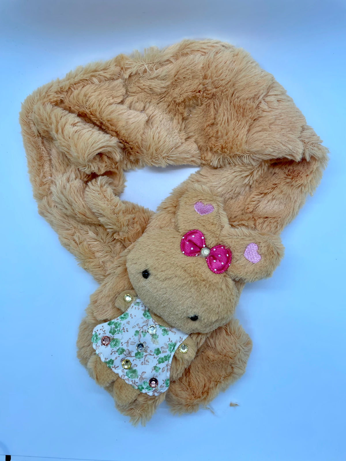 Beige plush scarf with rabbit decoration