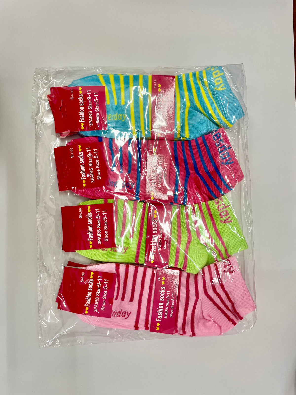 Packaged women’s ankle socks with multicolored stripes
