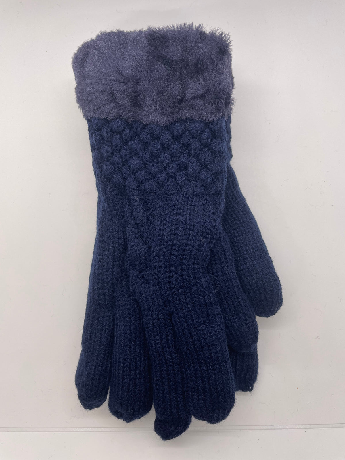 Navy cable-knit winter gloves with fuzzy cuffs