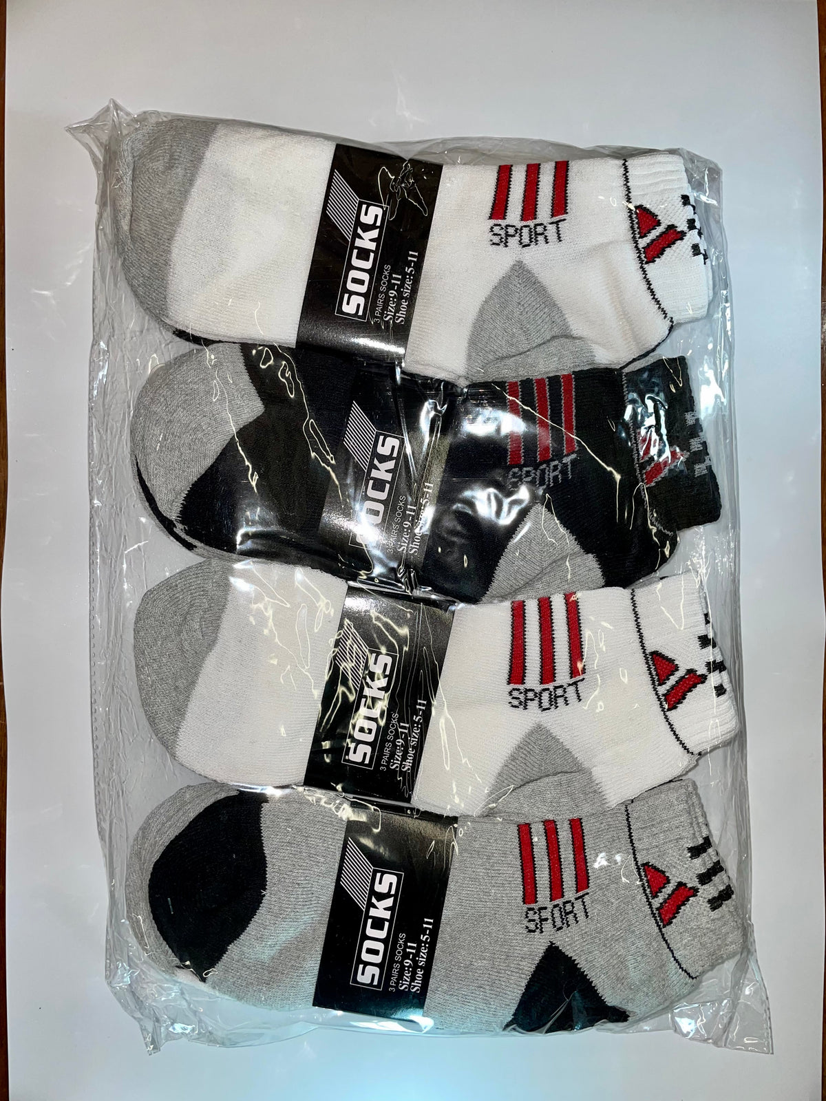 Packaged men’s ankle socks with striped sport designs