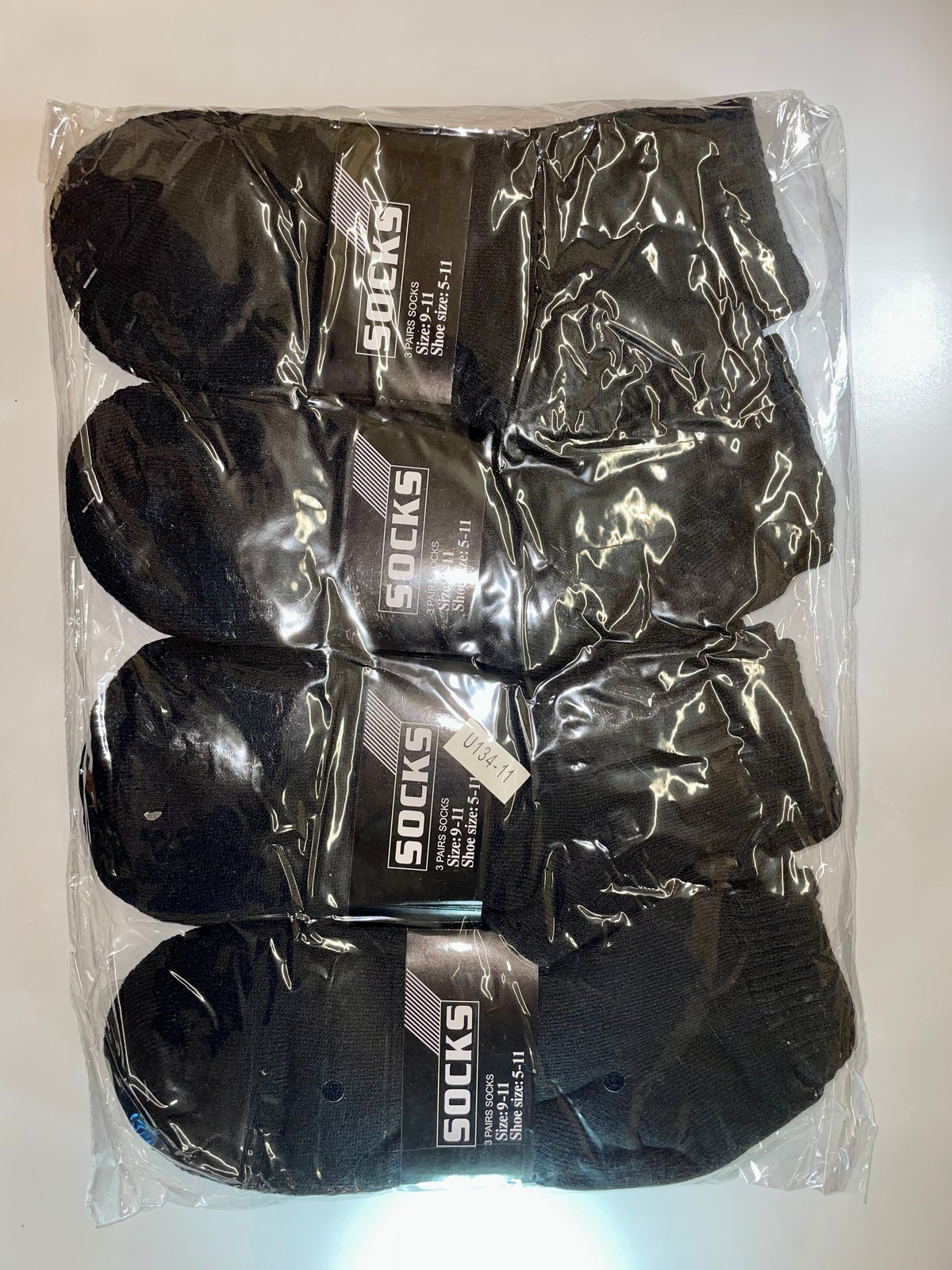 Packaged black men’s ankle socks
