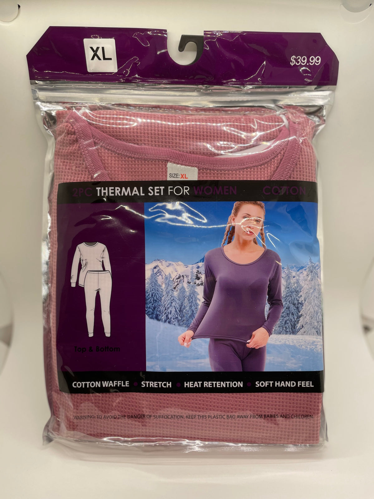 Pink women's thermal underwear in retail packaging