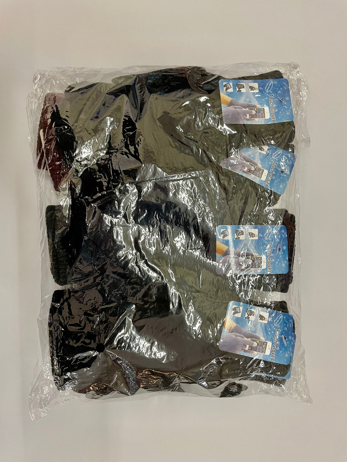 Packaged knit touchscreen gloves in several colors