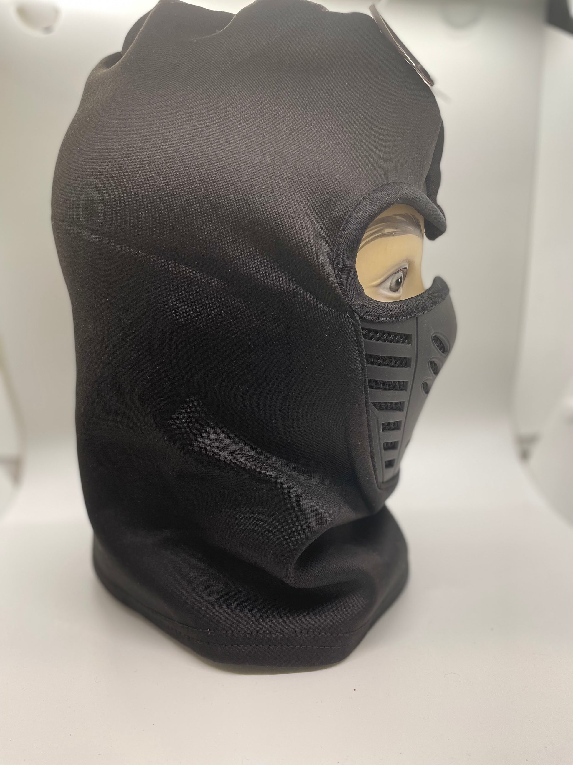 "Navy blue full face mask with a quilted texture and a buckle closure"