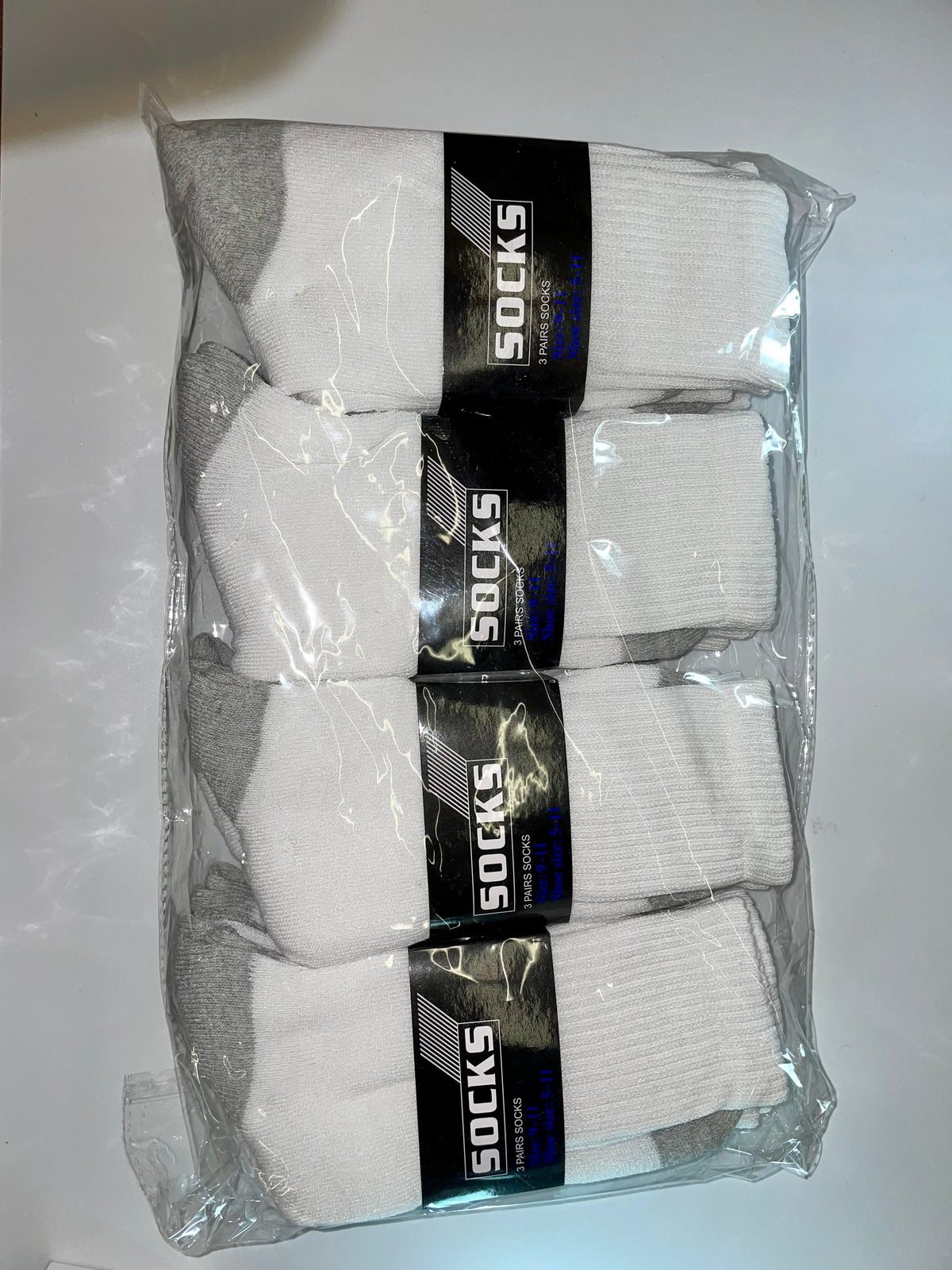 White crew socks with gray heel and toe areas