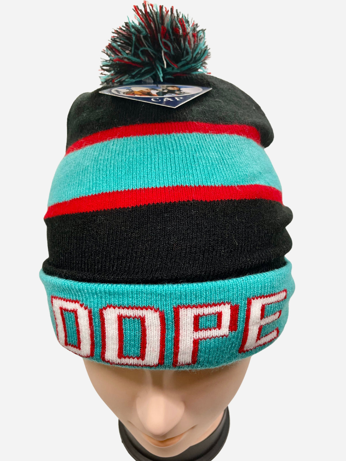 Black and turquoise Dope pom-pom beanie on a mannequin